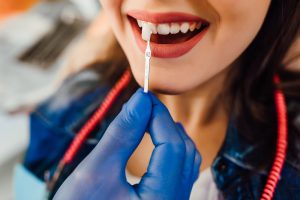 Woman receiving thorough dental bonding treatment at Prairie Star Dental in Round Rock