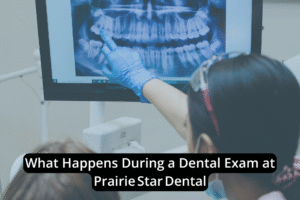 A dentist at Prairie Star Dental wearing gloves points at a dental X-ray on a monitor while discussing the dental exam with a patient.